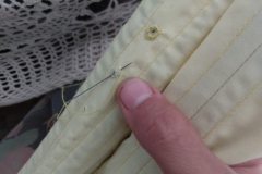 hand-stitching eyelets