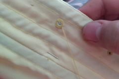 hand-stitching eyelets