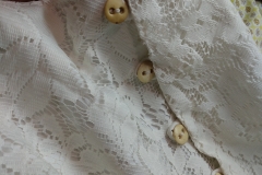 salvaged buttons on the back of the skirt, matching those of the top